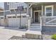 Two-story home with three-car garage, basketball hoop, and welcoming front entrance at 10991 Xanadu St, Commerce City, CO 80022