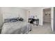 Spacious bedroom featuring a dedicated desk area, soft carpet, and neutral walls at 4357 W 118Th Pl, Westminster, CO 80031