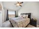 Inviting bedroom with a comfortable bed, soft carpeting, and scenic views at 4357 W 118Th Pl, Westminster, CO 80031