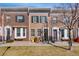 Attractive brick townhouses featuring bay windows, wrought iron railings, and manicured front yards at 4357 W 118Th Pl, Westminster, CO 80031