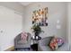 Bright sitting area features comfortable seating, a colorful rug, and modern artwork to create a relaxed space at 4357 W 118Th Pl, Westminster, CO 80031