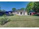 Backyard with grass, building and shed at 6054 Iris Way, Arvada, CO 80004