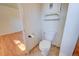Small renovated bathroom with toilet in view at 6054 Iris Way, Arvada, CO 80004