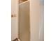 Bathroom showcasing a shower with glass doors at 6054 Iris Way, Arvada, CO 80004