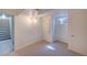 Bedroom with carpeting and two doors at 6054 Iris Way, Arvada, CO 80004