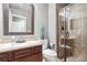 Bathroom featuring a vanity with granite countertop and glass-enclosed shower with tile surround at 10000 E Yale Ave # 41, Denver, CO 80231