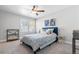 Cozy bedroom featuring soft carpet, neutral tones, and comfortable furnishings at 10000 E Yale Ave # 41, Denver, CO 80231