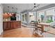 Eat-in kitchen features a breakfast nook, hardwood floors, and great natural light at 10000 E Yale Ave # 41, Denver, CO 80231