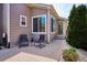 This lovely patio has chairs, table, and a nice walkway to the front door at 18477 E Amherst Dr, Aurora, CO 80013