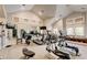 Bright gym equipped with modern machines, mirrors, and natural light, offering residents a convenient fitness solution at 8726 S Kline St # A204, Littleton, CO 80127