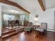 Dining area with hardwood floors and a built-in seating area at 1750 Vance St, Lakewood, CO 80214