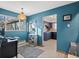 Bright dining area with view into the kitchen at 1750 Vance St, Lakewood, CO 80214