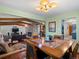 Open concept dining room, adjacent to living room and kitchen at 1750 Vance St, Lakewood, CO 80214