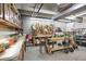Spacious basement featuring ample storage cabinets, work benches and concrete floors at 3675 S Cherokee St # 110, Englewood, CO 80110