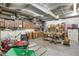 Spacious basement featuring ample storage cabinets, work benches and concrete floors at 3675 S Cherokee St # 110, Englewood, CO 80110