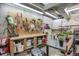 Spacious basement featuring ample storage cabinets, work benches and concrete floors at 3675 S Cherokee St # 110, Englewood, CO 80110