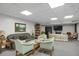 Inviting community lounge area featuring comfortable seating, soft lighting and neutral colors at 3675 S Cherokee St # 110, Englewood, CO 80110