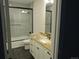 Modern bathroom with a sleek vanity, glass shower doors and contemporary fixtures at 1970 S Logan St, Denver, CO 80210