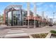 Contemporary building exterior with retail spaces on the ground floor at 105 Fillmore St # 204, Denver, CO 80206