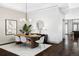 Open concept dining room with view into the kitchen at 105 Fillmore St # 204, Denver, CO 80206