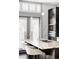 Island kitchen with granite countertop and modern fixtures at 105 Fillmore St # 204, Denver, CO 80206