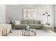 Sophisticated living room featuring a sectional sofa and stylish coffee table at 105 Fillmore St # 204, Denver, CO 80206