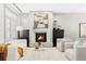 Modern living room featuring a fireplace and comfortable seating at 105 Fillmore St # 204, Denver, CO 80206