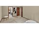 Hallway view leading to a bedroom and bathroom with natural light at 31258 Niakwa Rd, Evergreen, CO 80439