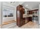 Well-appointed kitchen with stainless appliances, granite counters, and ample cabinet space at 13849 W 66Th Dr, Arvada, CO 80004