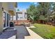Spacious backyard with patio, grill, and privacy fence, perfect for outdoor gatherings and relaxation at 10343 Stoneflower Dr, Parker, CO 80134