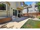 A lovely backyard features a barbecue, patio furniture, and a concrete patio perfect for entertaining guests at 10343 Stoneflower Dr, Parker, CO 80134