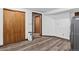 Spacious bedroom features wood floors, closet, and easy access to other rooms at 10343 Stoneflower Dr, Parker, CO 80134