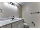 Bright bathroom featuring a modern vanity with white countertop at 10851 E Iliff Pl, Aurora, CO 80014