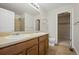 Bathroom with a double sink vanity and tiled floors, offering ample space and functionality at 23465 E Platte Dr # B, Aurora, CO 80016