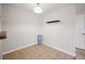 Clean and simple dining area with tiled floor and a view to the kitchen at 23465 E Platte Dr # B, Aurora, CO 80016