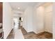 Bright entryway features wood floors, neutral walls, and ample natural light at 947 W Beverly St, Elizabeth, CO 80107
