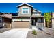 Charming two-story home with a well-manicured lawn, a two-car garage, and a welcoming front porch at 947 W Beverly St, Elizabeth, CO 80107