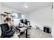 Functional office with a modern desk, computer setup, and comfortable chair at 947 W Beverly St, Elizabeth, CO 80107