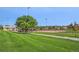 Scenic view of a lush green park with well-maintained baseball fields for community recreation at 479 Interlocken Blvd # 105, Broomfield, CO 80021