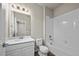Stylish bathroom with a white vanity, updated fixtures, and a shower-tub combination at 479 Interlocken Blvd # 105, Broomfield, CO 80021