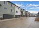 Modern townhomes featuring attached garages and colorful exteriors at 479 Interlocken Blvd # 105, Broomfield, CO 80021