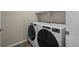 Convenient laundry room with modern, front-loading washer and dryer at 479 Interlocken Blvd # 105, Broomfield, CO 80021