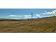 Overlook an expansive open field with a mountain backdrop for beautiful views at 479 Interlocken Blvd # 105, Broomfield, CO 80021