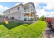 Two-story house with a stone facade and a spacious backyard at 23913 E Swallow Cir, Aurora, CO 80016