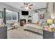 Comfortable bedroom features a modern ceiling fan, carpeted floor and a workstation at 23913 E Swallow Cir, Aurora, CO 80016