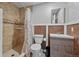 Stylish bathroom with tiled shower, modern vanity, and updated fixtures, creating a serene spa-like experience at 8532 W Eden Dr, Littleton, CO 80127