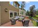 Inviting patio with outdoor seating, perfect for relaxing and entertaining with modern outdoor furniture at 8532 W Eden Dr, Littleton, CO 80127