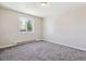 Comfortable bedroom with carpet, natural light, and neutral walls at 2340 Geneva, Aurora, CO 80010