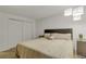Bright bedroom featuring a king size bed and closet at 1611 Garfield Ave # 2, Louisville, CO 80027