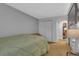 This bedroom features a comfortable bed, closet and neutral decor at 1611 Garfield Ave # 2, Louisville, CO 80027